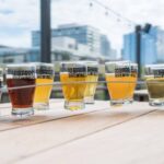 Tasting Skills - nine clear glass cups filled beverages