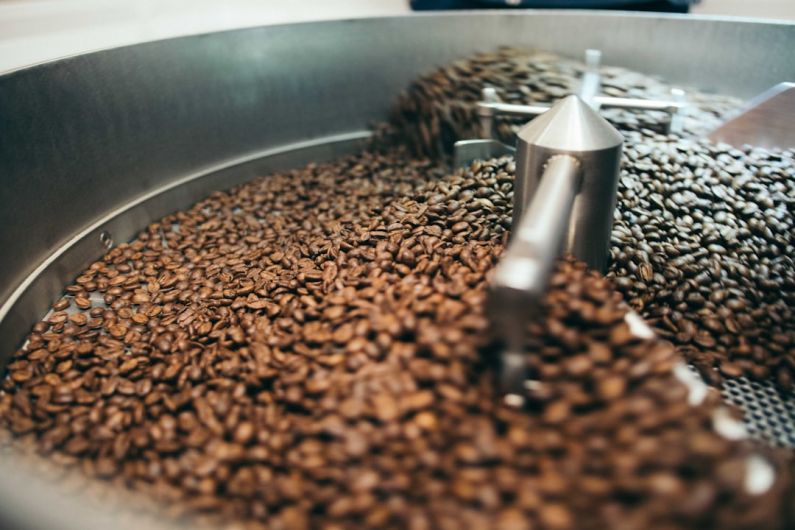 Roasts - coffee beans on grinde r