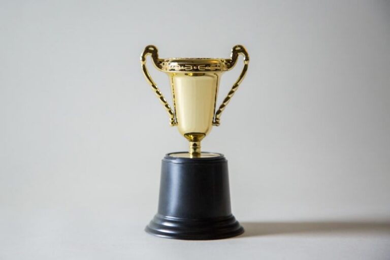 Competitions - yellow and white trophy