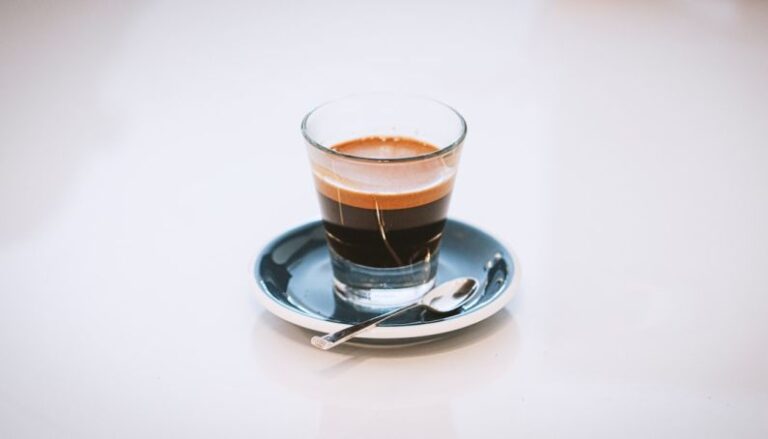 Espresso Technique - clear glass cup on saucer