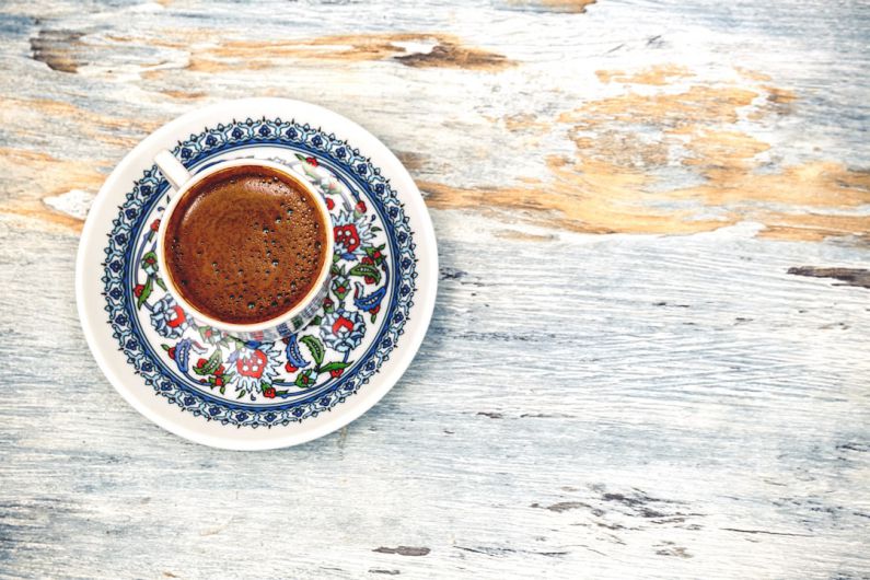 Turkish Coffee - flat lay photography of cup filled with coffee