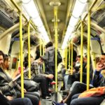 Urban Life - photo of group on people sitting inside train