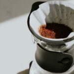 Third Wave - a close up of a coffee pot filled with coffee
