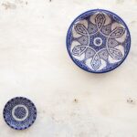 Manual Vs Automatic - two white-and-blue ceramic dinnerware