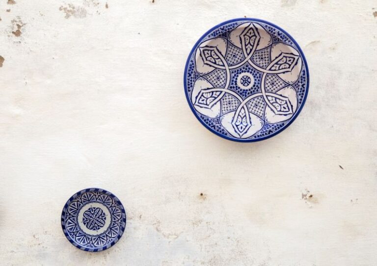 Manual Vs Automatic - two white-and-blue ceramic dinnerware