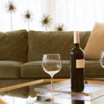 Home Grinders - black wine bottle beside two wine glasses